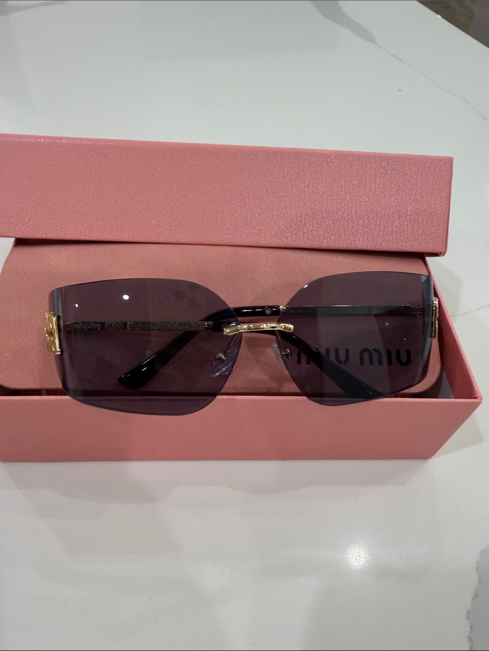 Designer Women's Rimless Sunglasses - Purple Lenses